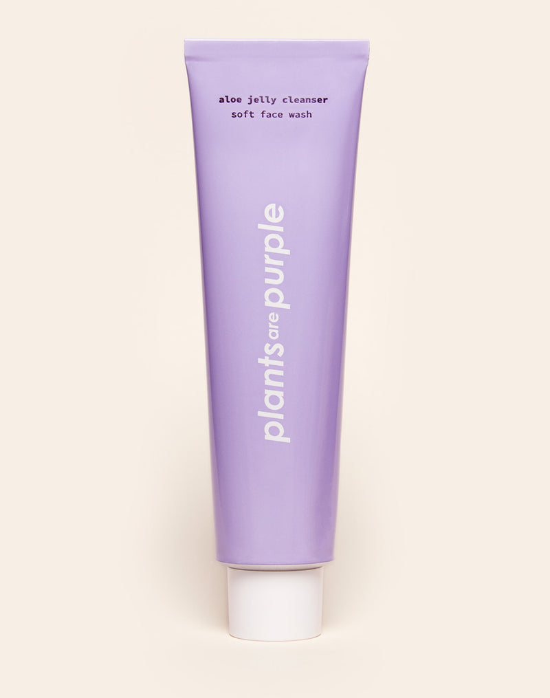 Purple tube of face wash labeled 'Plants are Purple' and 'aloe jelly cleanser.'