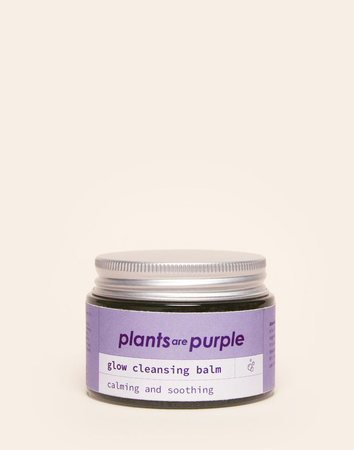 Jar of 'plants are purple' glow cleansing balm with lavender label.