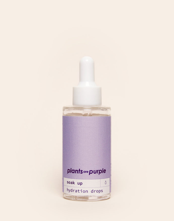 Glass bottle of hydration drops with a dropper and purple label.